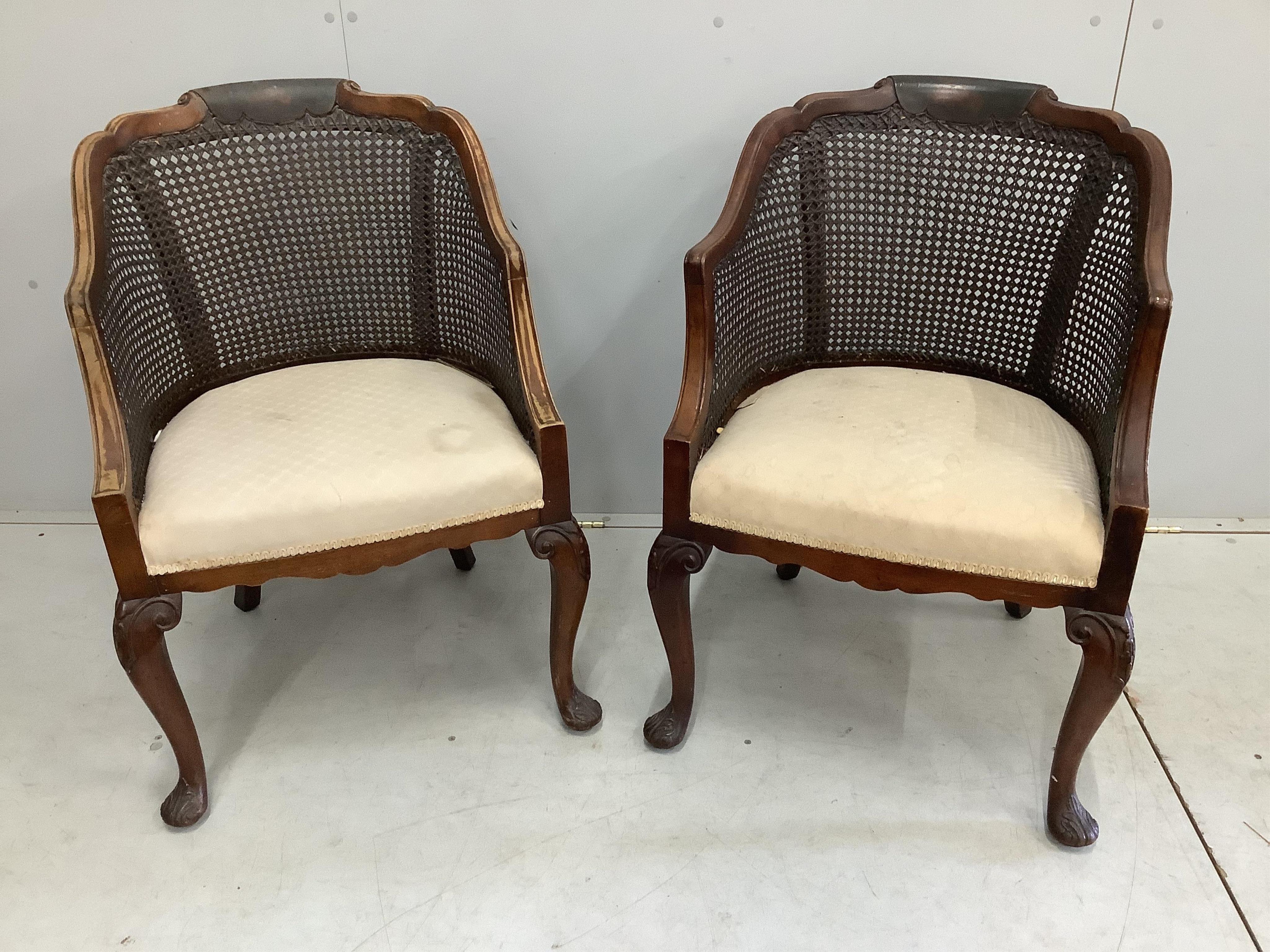 Four (two pairs) George I style painted walnut caned chairs and a similar circular nest of tables